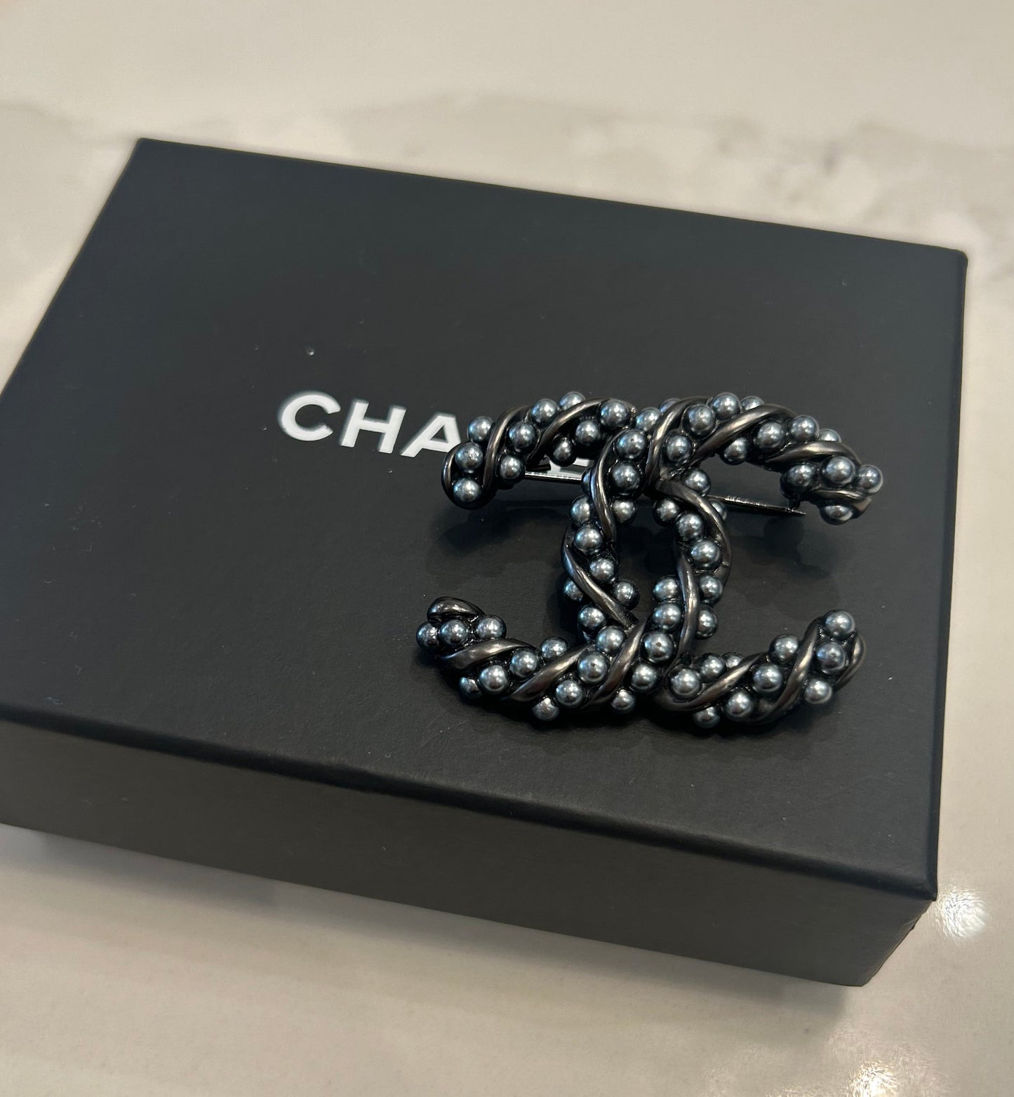 CHANEL Interlocking CC Brooch