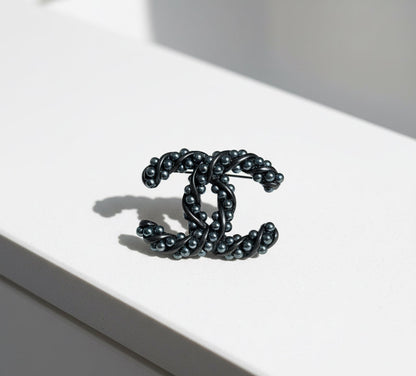 CHANEL Interlocking CC Brooch