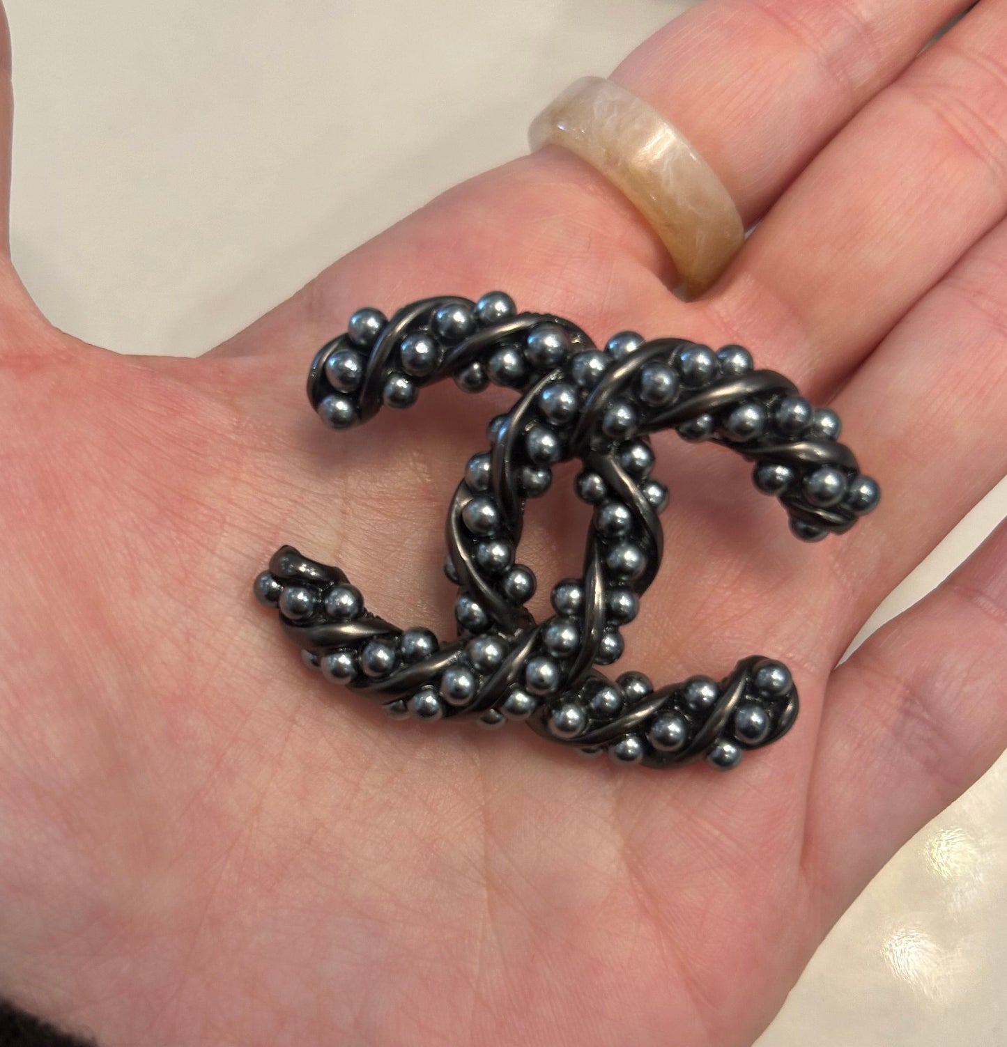 CHANEL Interlocking CC Brooch