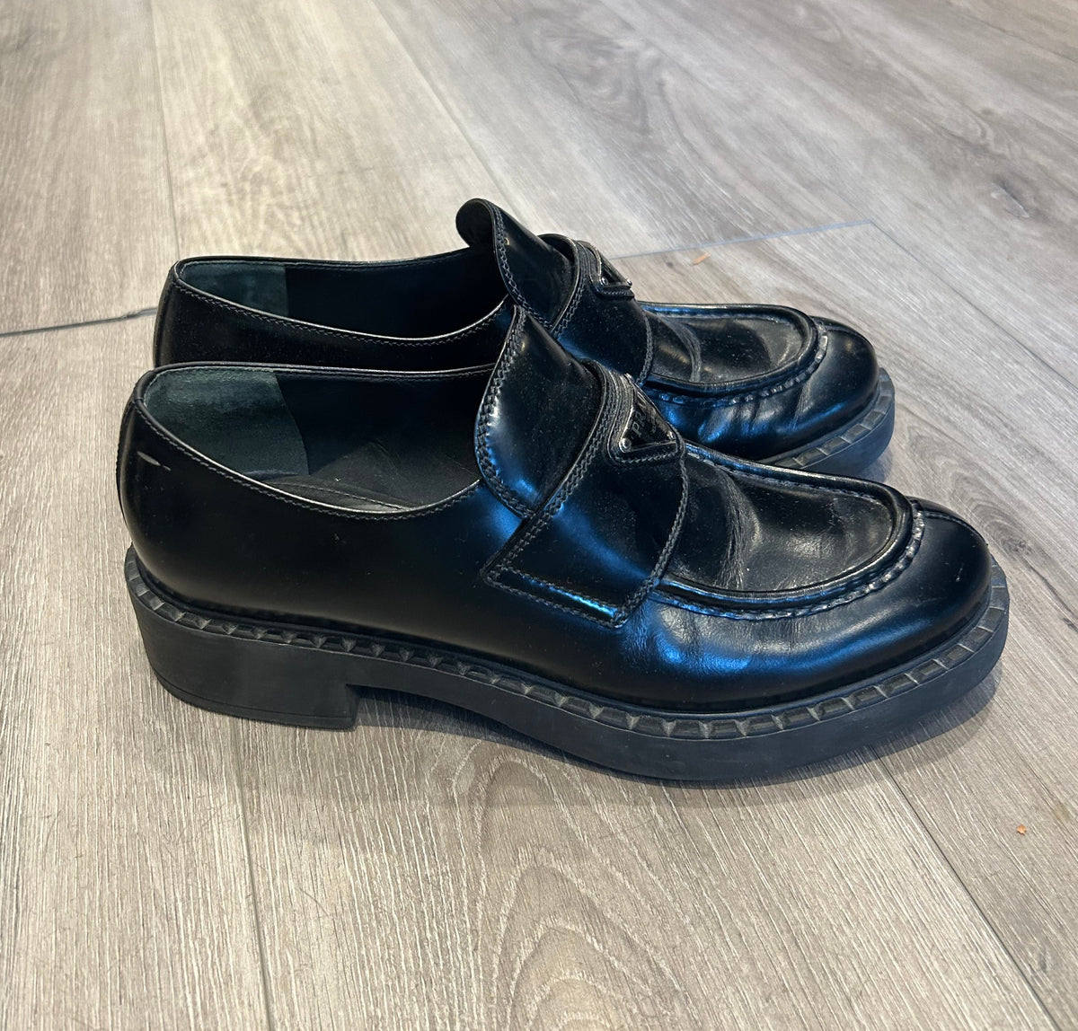 PRADA Black Leather Plaque Logo Loafers - Size 38.5