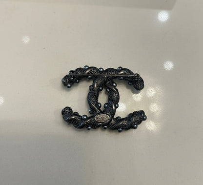 CHANEL Interlocking CC Brooch
