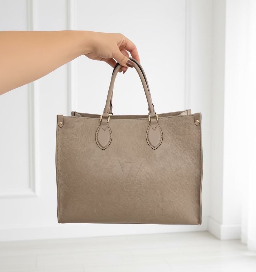 Louis Vuitton Onthego MM in Monogram Empreinte Turtledove