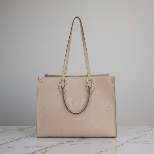 Louis Vuitton Onthego MM in Monogram Empreinte Turtledove